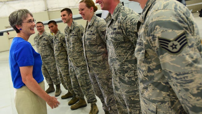 Secretary of the Air Force Heather Wilson shares a laugh with members of the 432nd Aircraft Maintenance Squadron, July 19, 2017, at Creech Air Force Base, Nev. During her visit, Wilson toured the base and gained insight into the dominant persistent attack and reconnaissance mission the Airmen of the 432nd WG complete 24/7/365 for our nation and coalition partners.