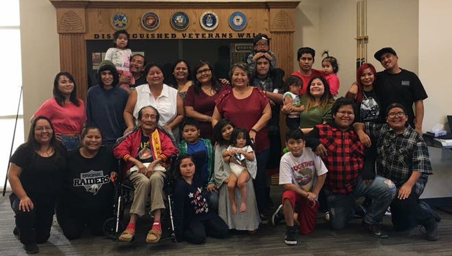 Samuel Tom Holiday, one of the last living Navajo Code Talkers, and his family in Ivins in 2017.