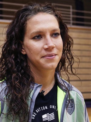 Two-time Olympic gold medalist (2008 and 2012) Lauren Holiday (formerly Cheney), a 2006 graduate of Ben Davis High School, returned to her alma mater for a youth clinic on Wednesday, May 20 2015. Holiday, who now lives in New Orleans, is a midfielder on the U.S. Women's National Soccer Team and is preparing for the World Cup. Holiday spoke to student athletes and helped out Ben Davis strength coach Kevin Vanderbush.