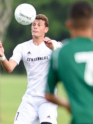 Ankeny Centennial's Kenan Smajlovic (7) heads the ball back up field on Friday, June 5, 2015, during the 2015 Boys State Soccer Championship held at the Cownie Soccer Park.