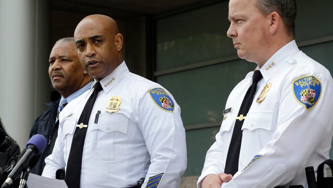 Baltimore Police Department Commissioner Anthony Batts announces that the department's investigation into the death of Freddie Gray was turned over to the State's Attorney's office a day early at a news conference, Thursday, April 30, 2015, in Baltimore. Pictured at right is Deputy Commissioner Kevin Davis. Batts did not give details of the report or take questions. He said the department dedicated more than 30 detectives to working on the case and report.  ( (AP Photo/Patrick Semansky)