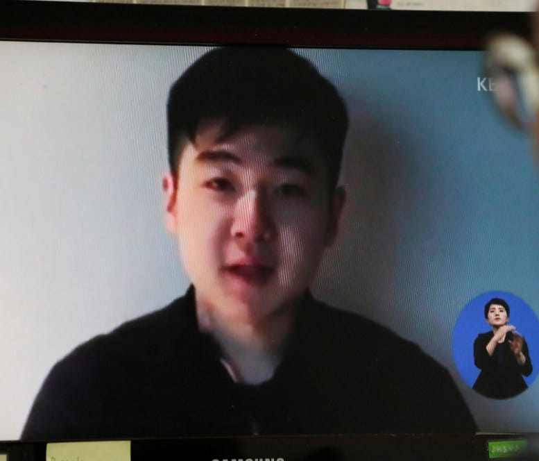 A screen displays a news report in Seoul on March 8 on a video of a man claiming to be Kim Han-sol, the son of late Kim Jong-nam.