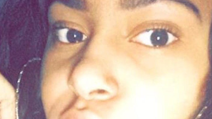 Girl killed in bathroom 'didn't believe in fighting,' friends say