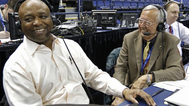 Radio announcer Gene Deckerhoff, right, interviews Florida State head coach Leonard Hamilton, left, before an NCAA college basketball game between Clemson and Florida State in the second round of the Atlantic Coast Conference tournament in Greensboro, N.C., Wednesday, March 11, 2015. (AP Photo/Bob Leverone)