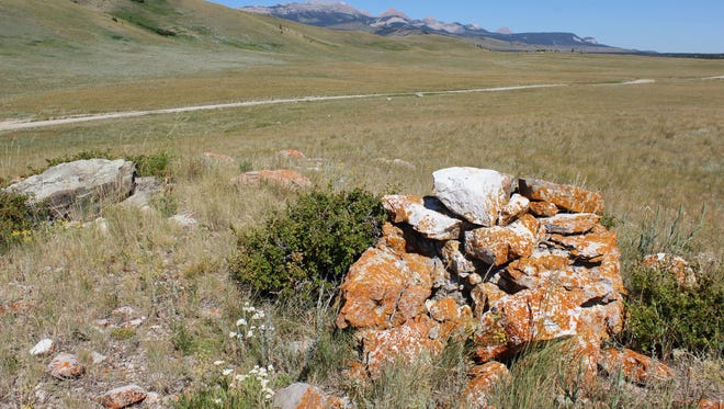 A well-preserved cairn along a historic buffalo run near Pine Butte.