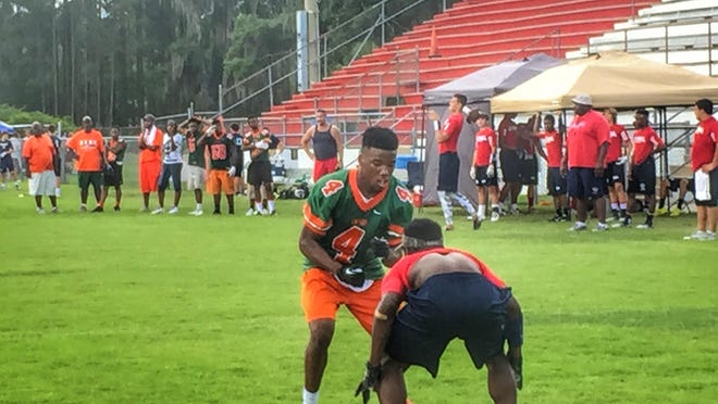 FAMU DRS rising senior Chris Jackson starts a route against coverage from a Wakulla defensive back in last Saturday’s 7on-7 tournament in Wakulla.