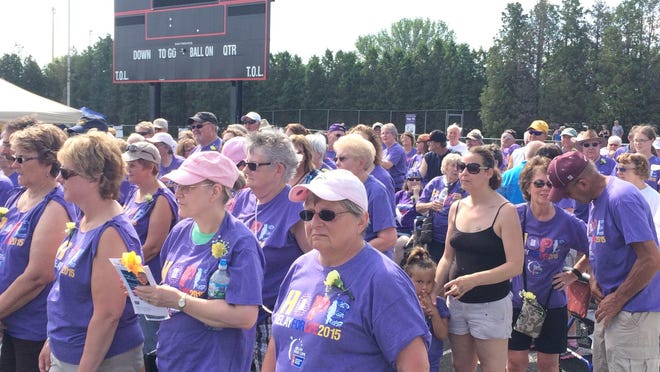Cancer survivors leading the 2015 Manitowoc Relay for Life.