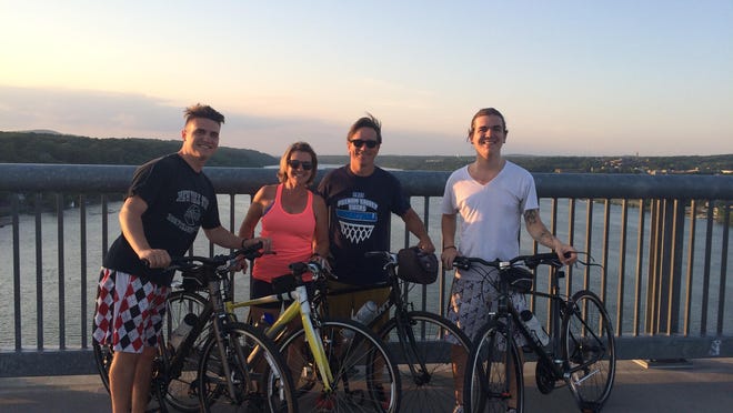 The Carlin family of Poughkeepsie, left to right, Hayden, Kim, Gerry and Bailey, enjoy outdoor trips together, including their recent outing biking over the Walkway Over the Hudson.