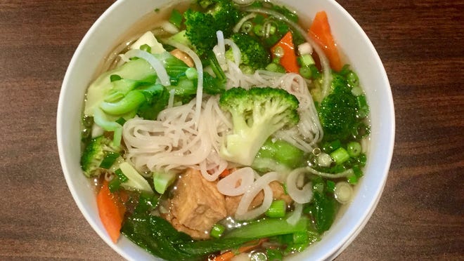 No. 19 pho is chockablock with vegetables and tofu.