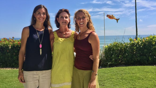 From left: Real estate agent Abby Barclay, homeowner Lindsey Bradshaw and her daughter Virginia.
