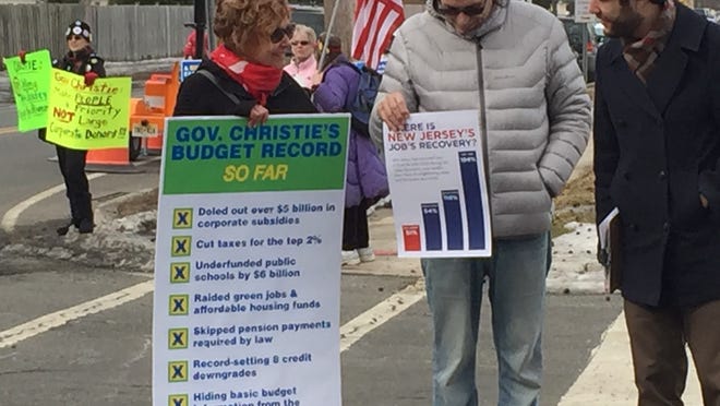 Protestors outside Gov. Chris Christie’s town hall in Somerville Tuesday (iPhone photo)