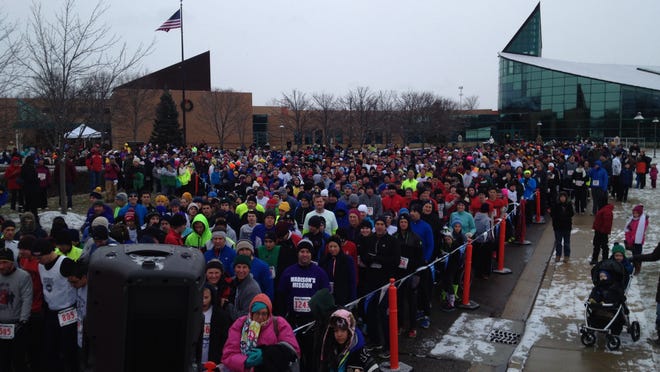 
Crowds get ready to run during a previous Turkey Trot for a Cause in Canton.
