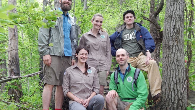 
This year’s trail stewards are from left in front are Kali Bird of Kingston, who launched last year’s program and Matt Decker of Beacon. In back are Brian Tragno of Union City, N.J.; Karen Melanson of Hopewell Junction and Malachy Labrie-Cleary of Cold Spring.




