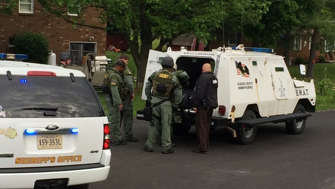 Augusta County SWAT before they converged on a suspect’s Verona home in May 2014.