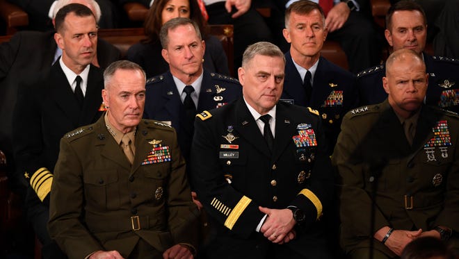 The Joint Chiefs of Staff listen as President Donald Trump addresses a joint session of Congress.