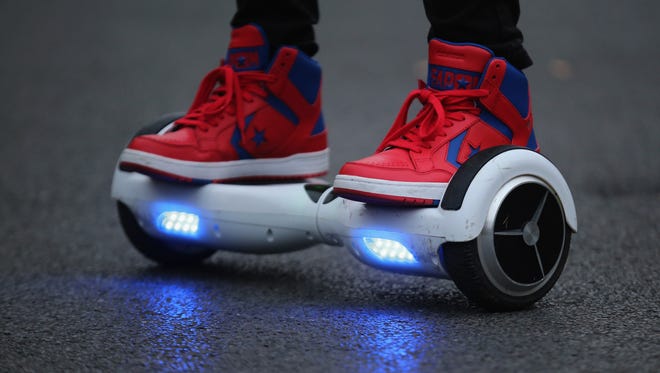 A youth rides a hoverboard, which are also known as self-balancing scooters and balance boards, on Oct. 13, 2015 in Knutsford, England.