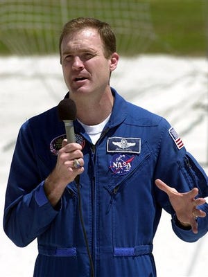 FILE -In this Thursday, April 6, 2000 file photo, Space shuttle Atlantis mission commander James Halsell Jr. speaks to reporters at the Kennedy Space Center in Cape Canaveral, Fla, about a problem with the Atlantis. Halsell Jr. of Huntsville was arrested after a crash that killed 11-year-old Niomi Deona James and 13-year-old Jayla Latrick Parler of Brent early Monday, June 6, 2016. (AP Photo/Peter Cosgrove, File)