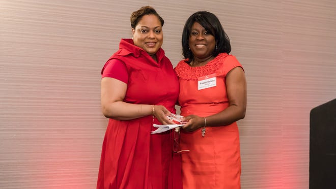 Stephern Allison (left), DHSc, PA, MBA, Vice President of Cardiovascular Services and Care Management at Robert Wood Johnson University Hospital and chair of the 15th Annual Garden State Go Red For Women Luncheon, with the Rev. Natalie Michem, RD, 2017 American Heart Association Woman of Distinction in the Non-Profit, Community and Civic category.