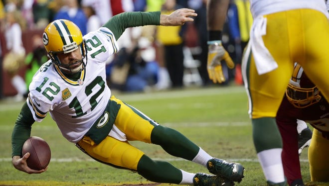 Green Bay Packers quarterback Aaron Rodgers is sacked in the end zone for a Washington safety in the first quarter of an NFC wild-card playoff game Jan. 10 in Landover, Maryland.
