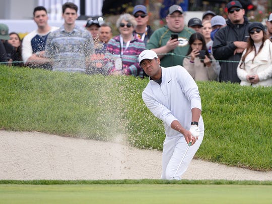 Jan 26, 2020; San Diego, California, USA; Tony Finau plays a shot from a bunker on the 18th hole during the final round of the Farmers Insurance Open golf tournament at Torrey Pines Municipal Golf Course - South Co. Mandatory Credit: Orlando Ramirez-USA TODAY Sports