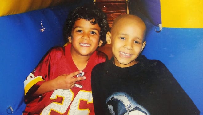 Jayden Williams, left, and Laketon Matthews were best friends growing up. Laketon died when he was 7 after a battle with leukemia.