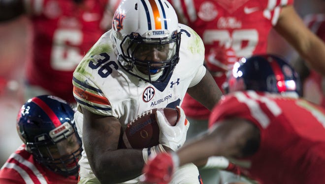 Auburn tailback Kamryn Pettway (36) announced on Jan. 3, 2018 that he'll forego his final year of eligibility in order to enter the NFL draft.