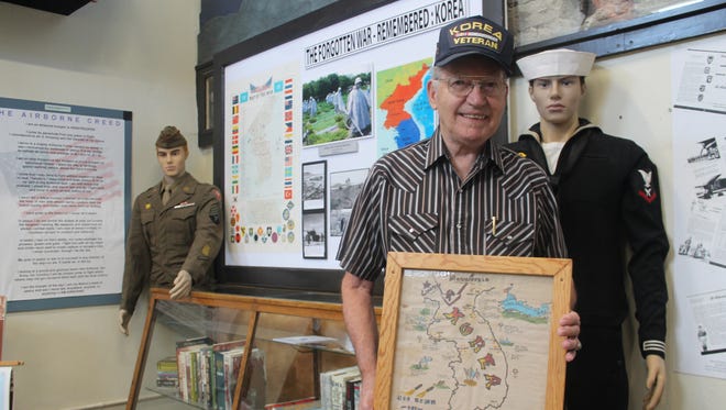 Frank Enyeart, who served in the Navy during the Korean War from 1950 to 1953, donated this display for the Tularosa Basin Museum of History's exhibit.