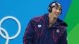 Michael Phelps preps for the men's 4x100m freestyle
