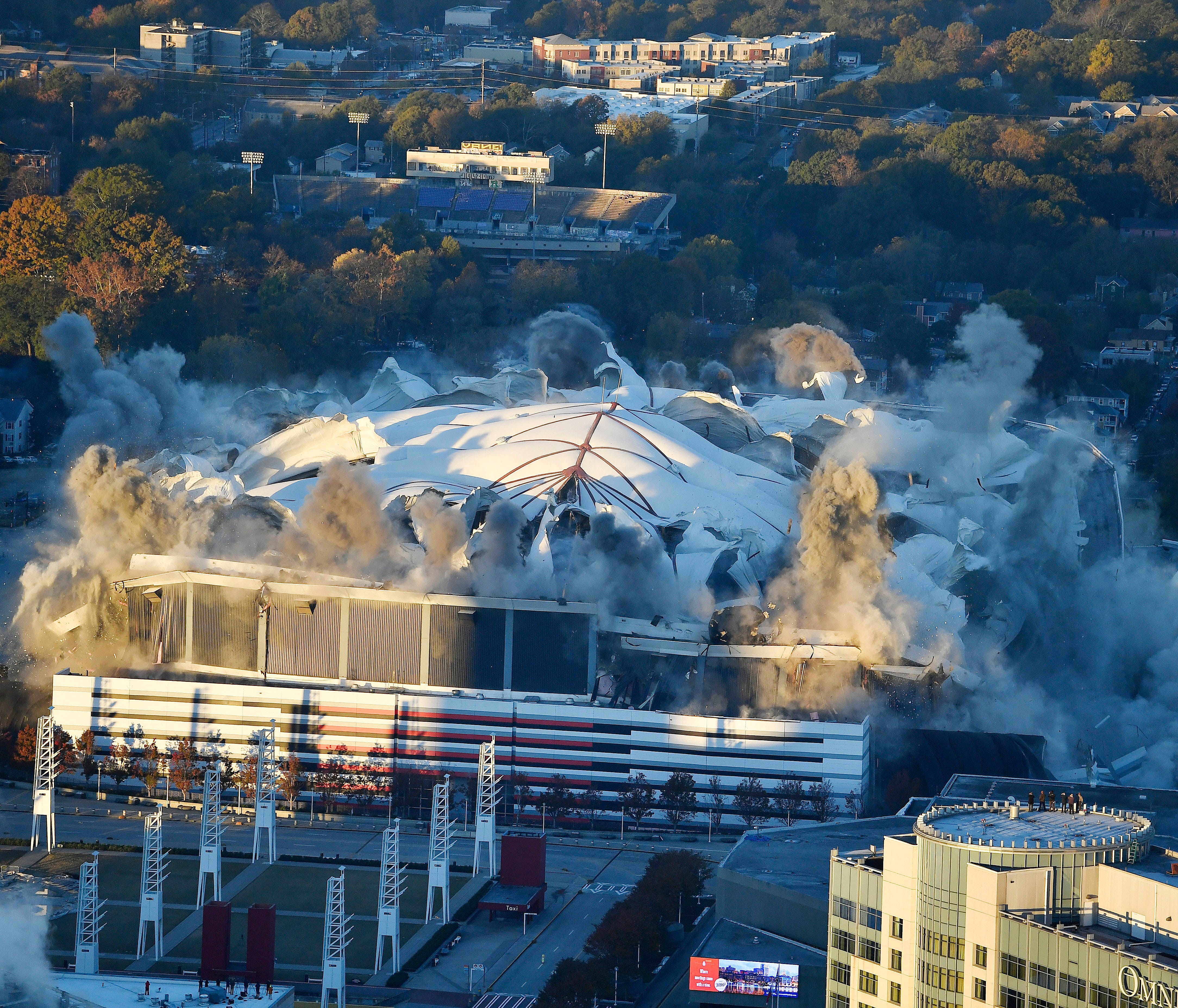 The Georgia Dome is destroyed in a scheduled implosion Monday, Nov. 20, 2017, in Atlanta. The dome was not only the former home of the Atlanta Falcons but also the site of two Super Bowls, 1996 Olympics Games events and NCAA basketball tournaments am