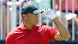 Tiger Woods gets ready to tee off on the first hole