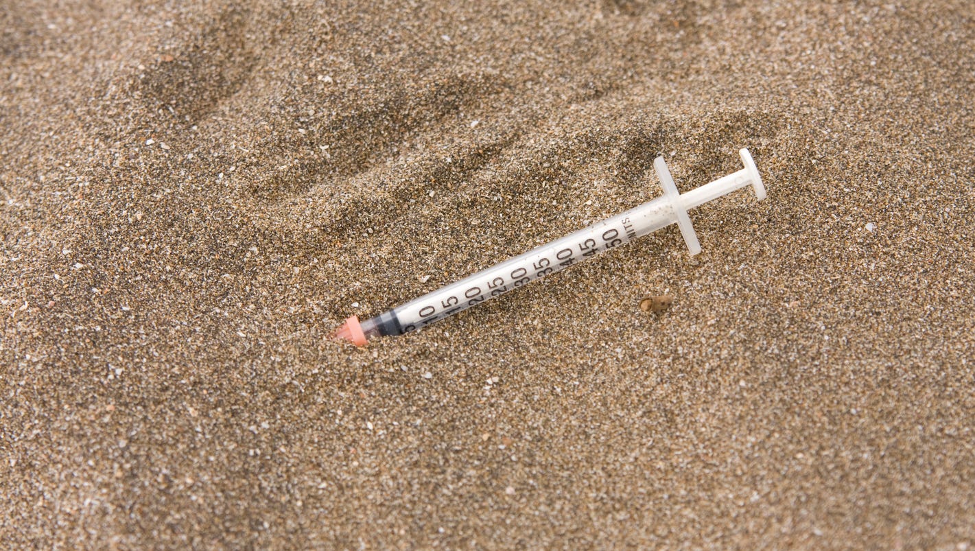Here's what to do if you find a drug syringe in public