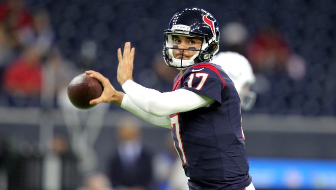 Oct 16, 2016; Houston, TX, USA;  Houston Texans quarterback Brock Osweiler (17) warms up prior to the game against the Indianapolis Colts at NRG Stadium.