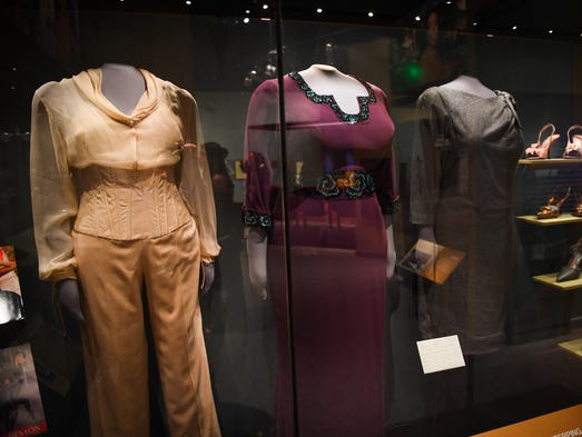 The L'Wren Scott dress, center, worn by Oprah Winfrey