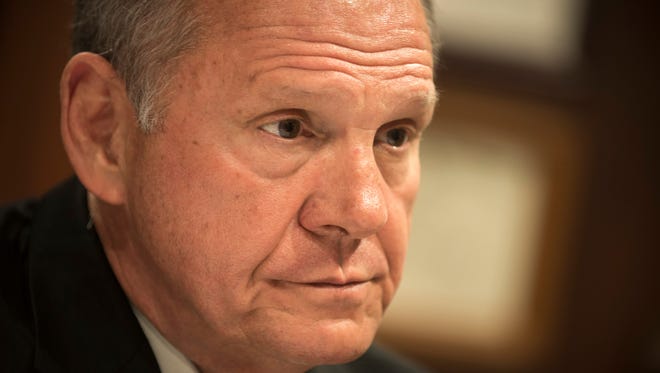 Alabama Chief Justice Roy Moore says he is "saddened for the future of the country" and he predicted "a religious battle that is just beginning."