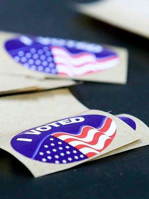 Stickers were given to voters who cast ballots on Tuesday at the San Juan County Fire Operations Center in Aztec.