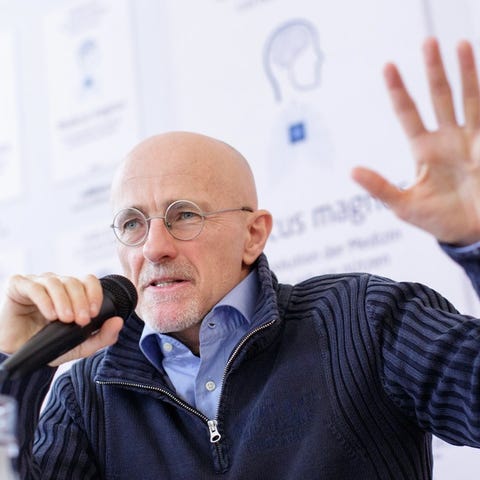 Italian neurosurgeon Sergio Canavero gestures as...