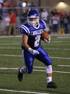 Chillicothe's Connor Mathis carries the ball against Jackson at Herrnstein Field last season. The Cavaliers and Ironmen will meet this fall in Week 10. Most think the outcome will determine a Frontier Athletic Conference title.