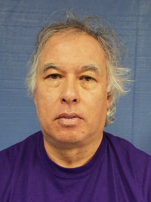 Michael McIntyre, a Collingswood handyman, was charged Friday with possession of child pornography.