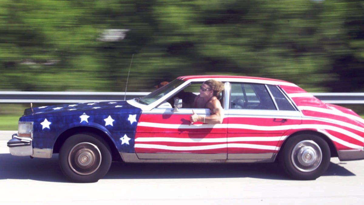 Patriotism on wheels Cars painted up as American flags