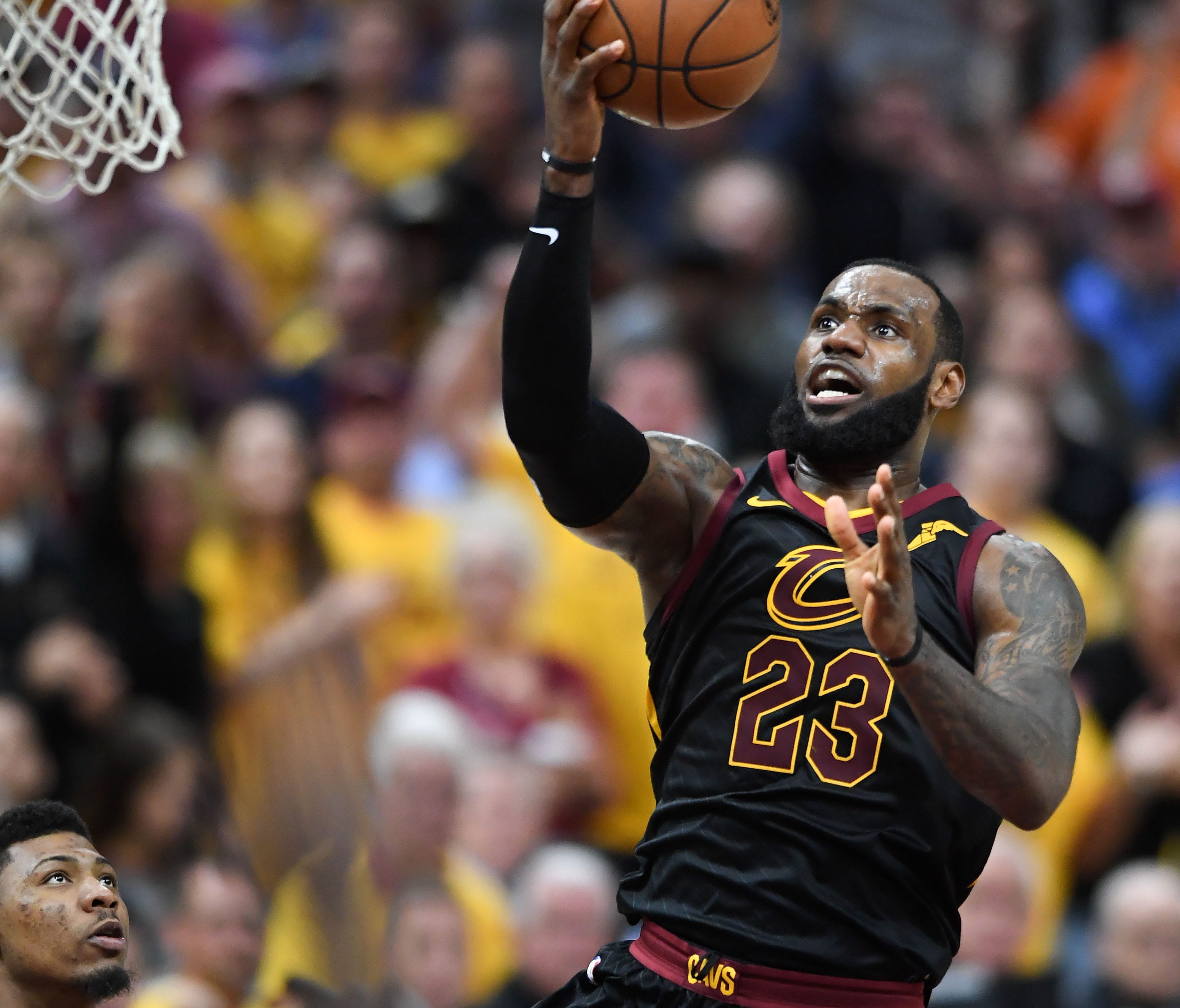 Cleveland Cavaliers forward LeBron James (23) attempts a layup against the Boston Celtics during the third quarter in game four of the Eastern conference finals of the 2018 NBA Playoffs at Quicken Loans Arena.