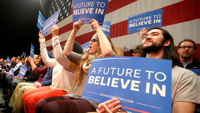 Supporters take in a campaign stop by Democratic presidential candidate Bernie Sanders last week at the Fox Cities Performing Arts Center in Appleton.