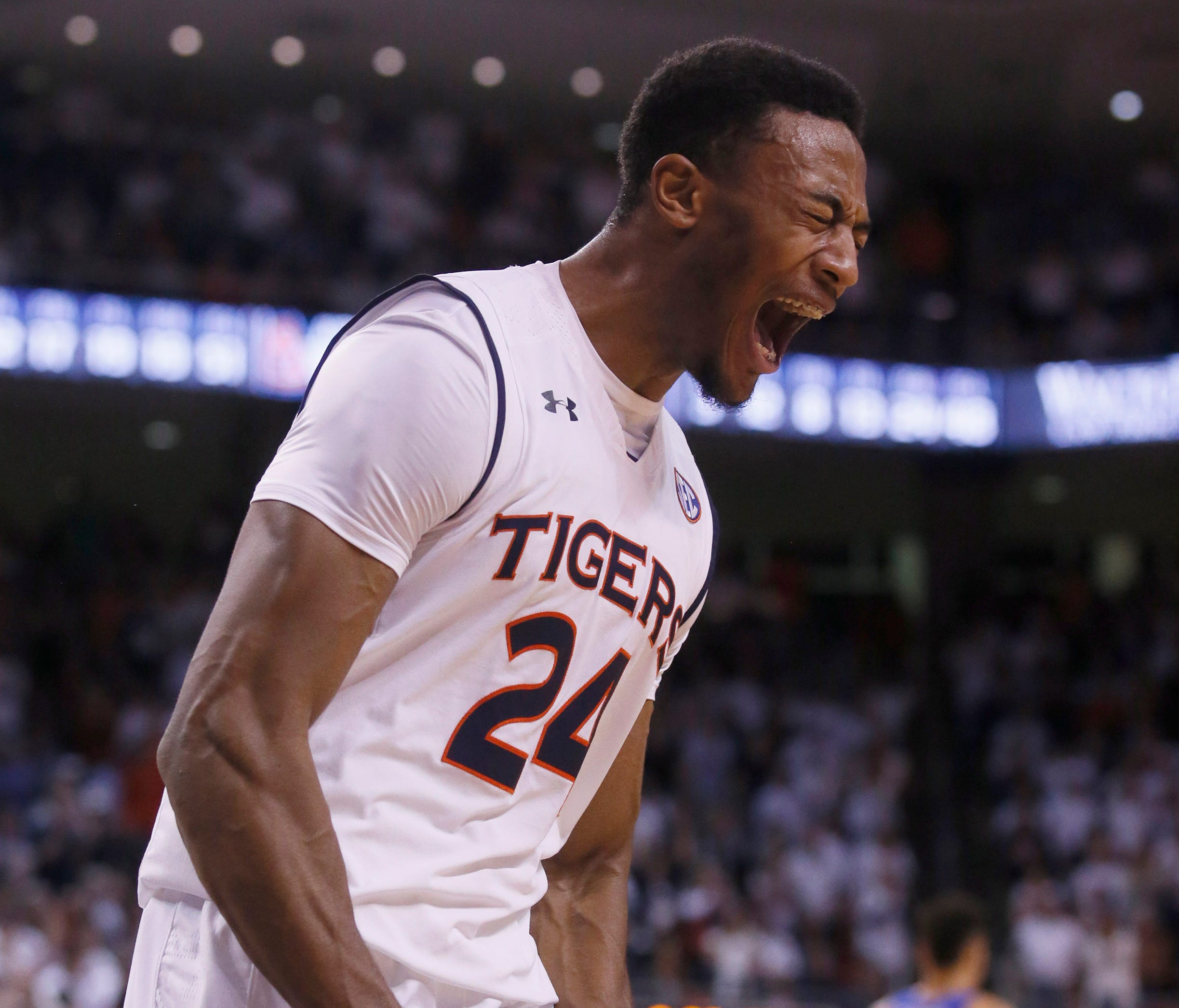 Auburn Tigers forward Anfernee McLemore (24) reacts after being fouled by the Kentucky Wildcats during the second half at Auburn Arena.  The Tigers beat the Wildcats 76-66.