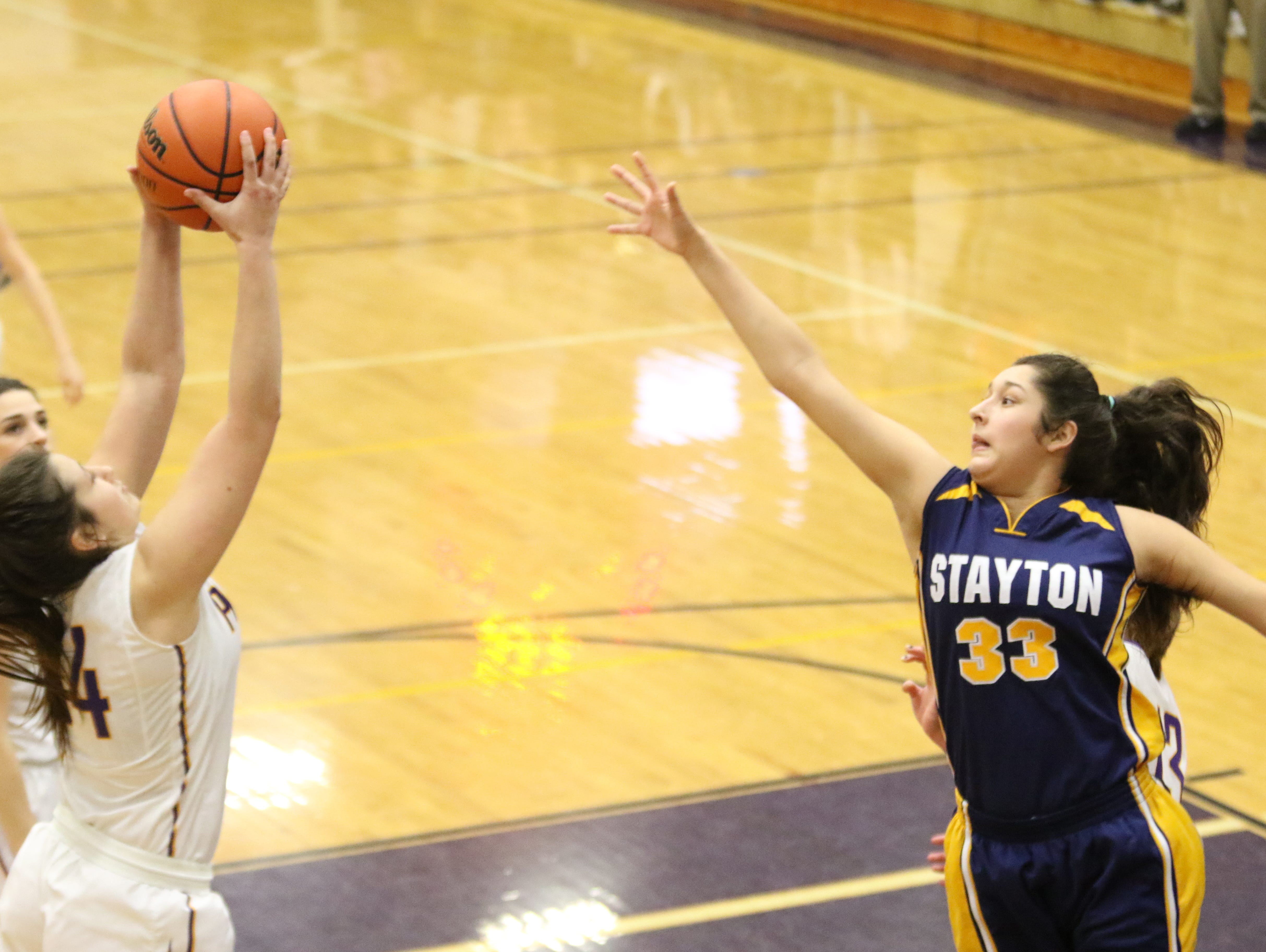 Stayton's Marri Martinez-Pallares (33) reaches for the ball against Marshfield on Saturday, March 4, 2017.