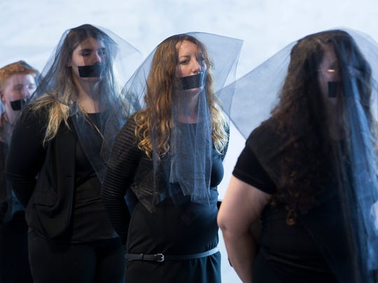 Women's reproductive rights activists who oppose the nomination of Judge Brett Kavanaugh to the U.S. Supreme Court wear black veils and tape over their mouths outside the hearing room during the Senate Judiciary Committee's confirmation hearing on Kavanaugh, in Washington, D.C., Sept. 7, 2018. EPA-EFE/MICHAEL REYNOLDS