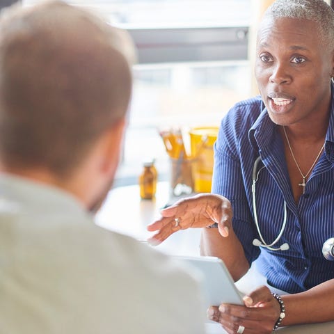 Doctor talking with patient.