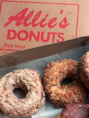 A doughnut shop in Rhode Island ignited a firestorm of public opinion when it decided to end a discount for police and the military.