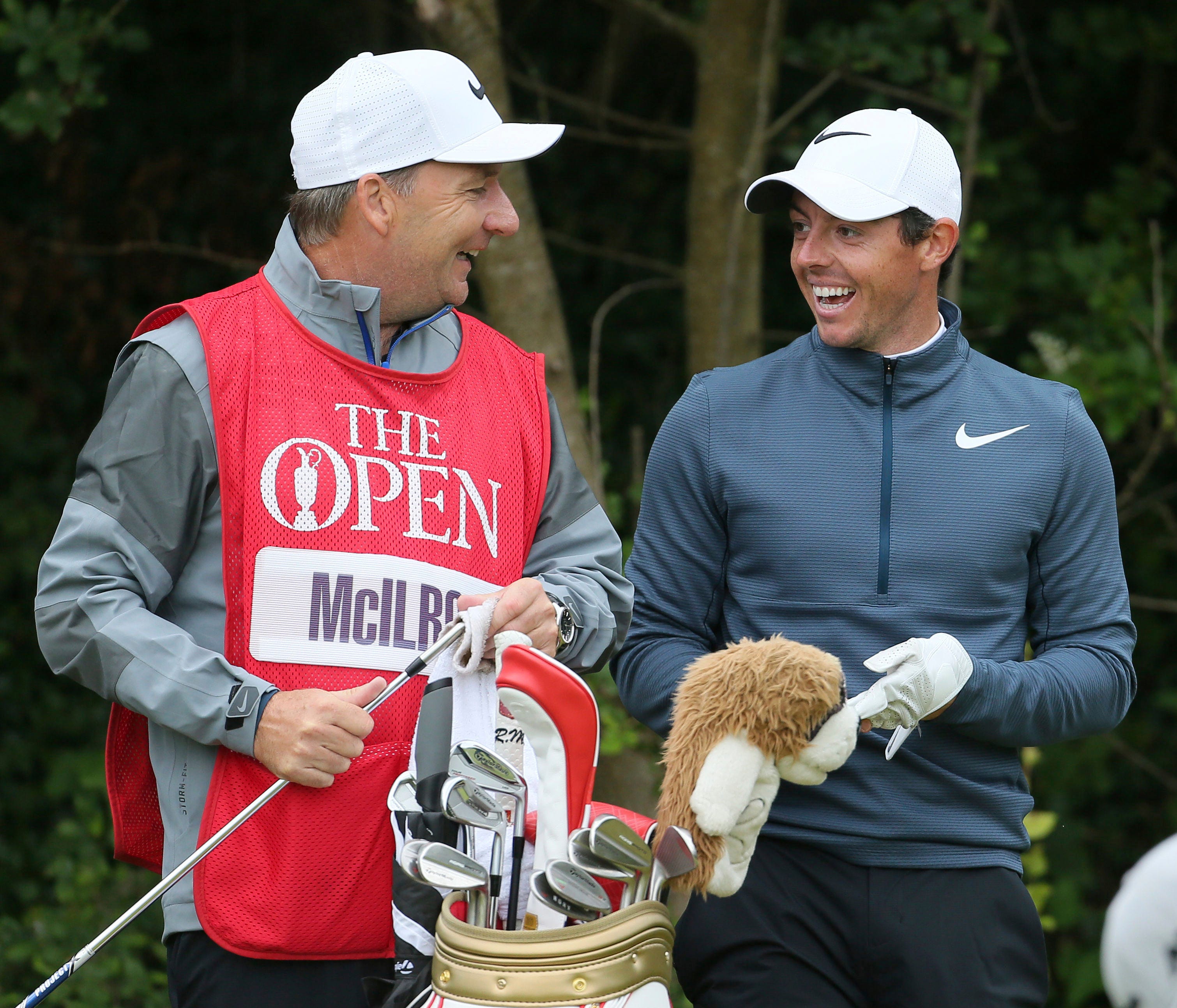 Northern Ireland's Rory McIlroy speaks with his caddie JP Fitzgerald during the second round of the British Open Golf Championship at Royal Birkdale,, Southport, Friday July 21, 2017. (Richard Sellers/PA via AP) ORG XMIT: TH807