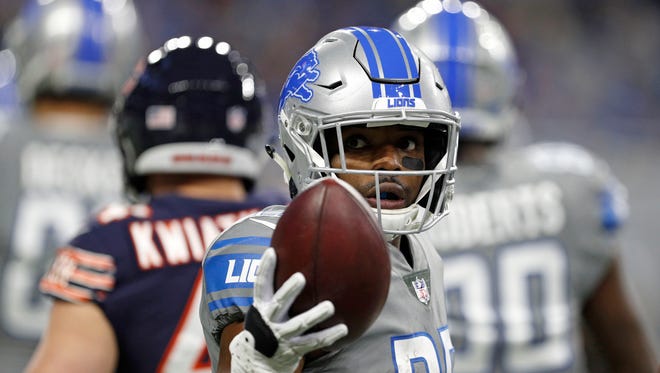 Dec 16, 2017; Detroit, MI, USA; Detroit Lions running back Theo Riddick holds the ball after a play in the first quarter against the Chicago Bears at Ford Field.