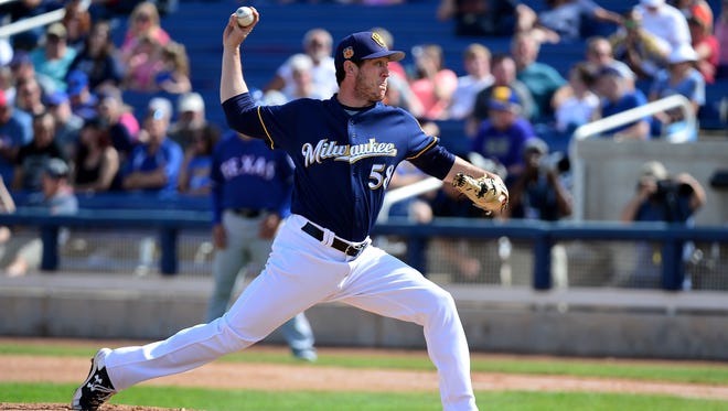 Rob Scahill delivers a pitch in a spring training game on March 4 in Phoenix.