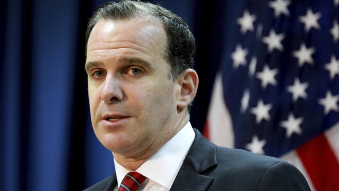 FILE - In this June 7, 2017 file photo, Brett McGurk, the U.S. envoy for the global coalition against IS, speaks during a news conference at the U.S. Embassy Baghdad, Iraq. McGurk has resigned in protest to President Donald Trump’s abrupt decision to withdraw U.S. troops from Syria, joining Defense Secretary Jim Mattis in an administration exodus of experienced national security officials. AP Photo/Hadi Mizban)